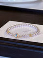Bracelet perles breloque trèfle