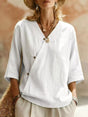 Blouse cache-cœur manches trois-quarts
