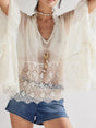 Cache-maillot en dentelle manches longues