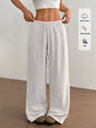 Pantalon large à cordon et poches